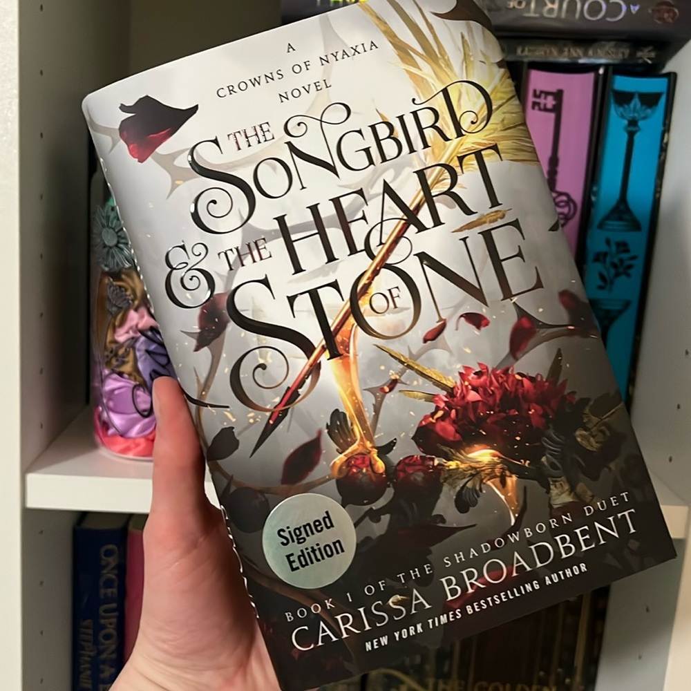 Signed The Songbird & The Heart of Stone